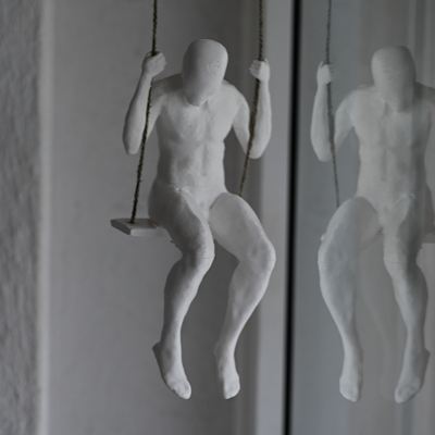 Sculpture by Ivo Meier - climbing high